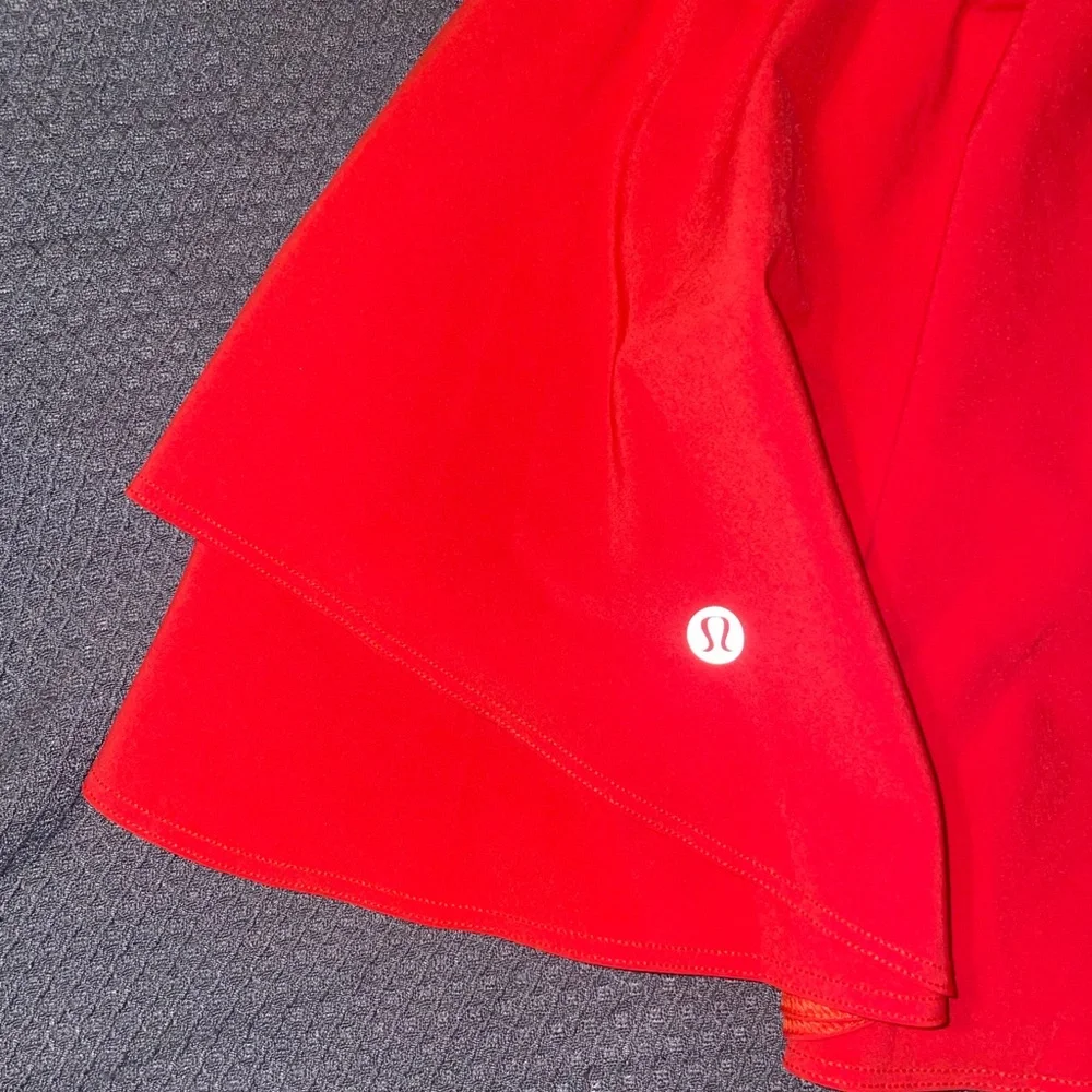 Lululemon Court Rival 14” Skirt in a vibrant Coral color - Picture 5 of 12